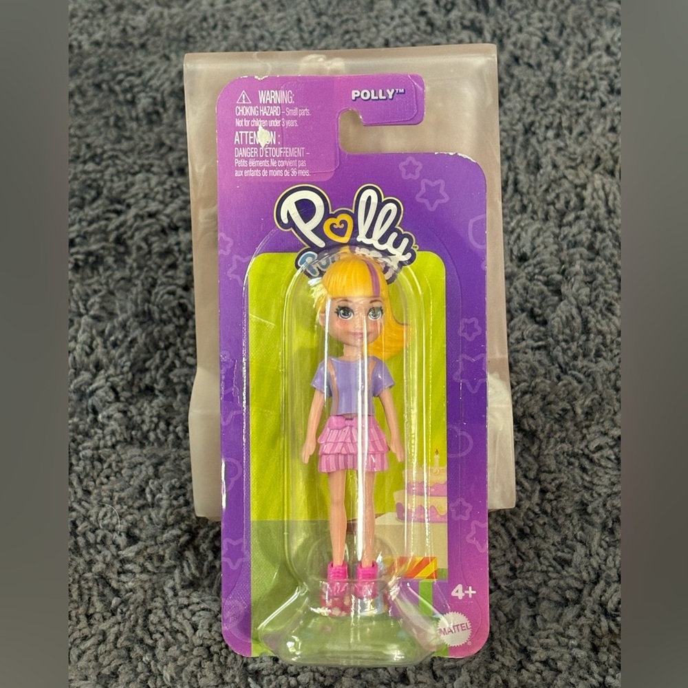 NWT Polly Pocket doll, Polly. - in purple shirt and pink skirt